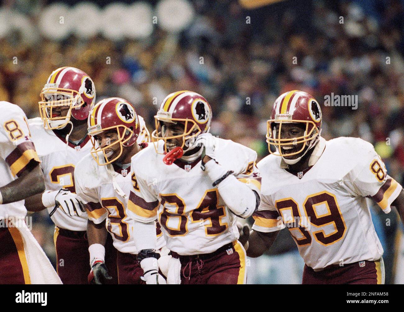 Washington Redskins Ricky Sanders (83) takes off as Minnesota Vikings Joey  Browner (47) runs after him during first quarter NFC Championship game  action, Sunday, Jan. 17, 1988 at RFK Stadium in Washington.