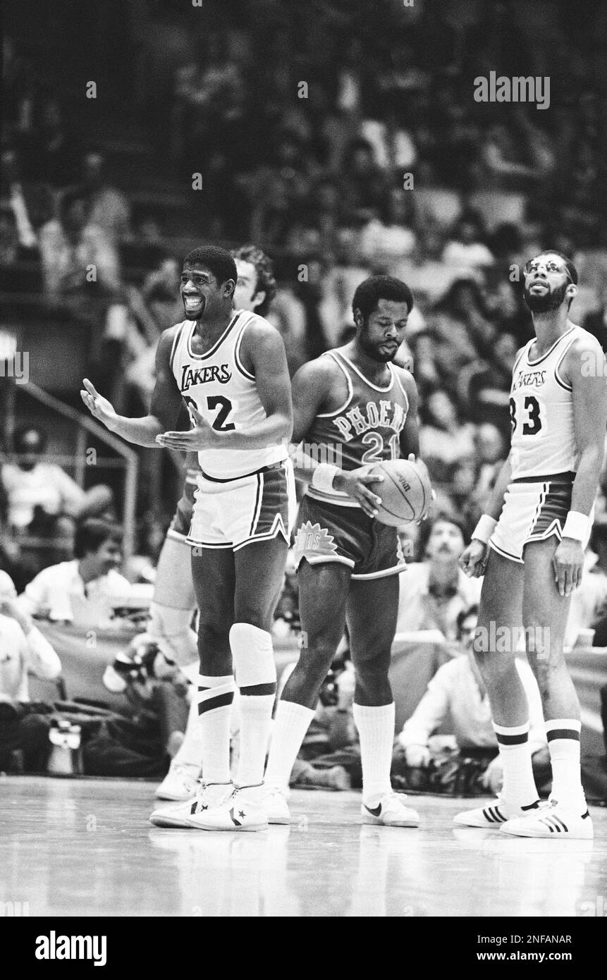 Los Angeles Lakers Earvin "Magic" Johnson pleads his innocence after he