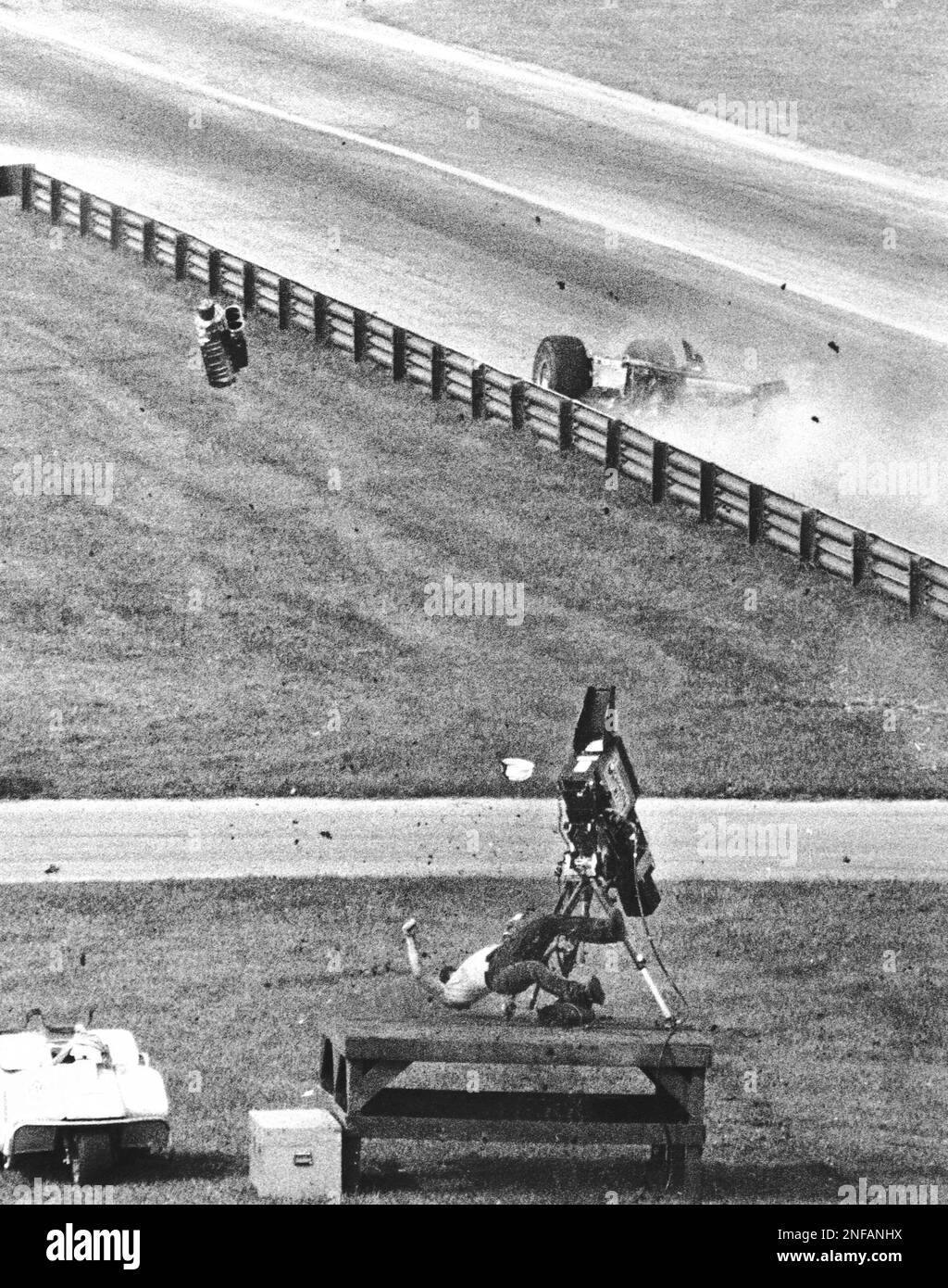 A dragster supercharger hits cameraman Joe Rooks of Bowling Green, Ohio