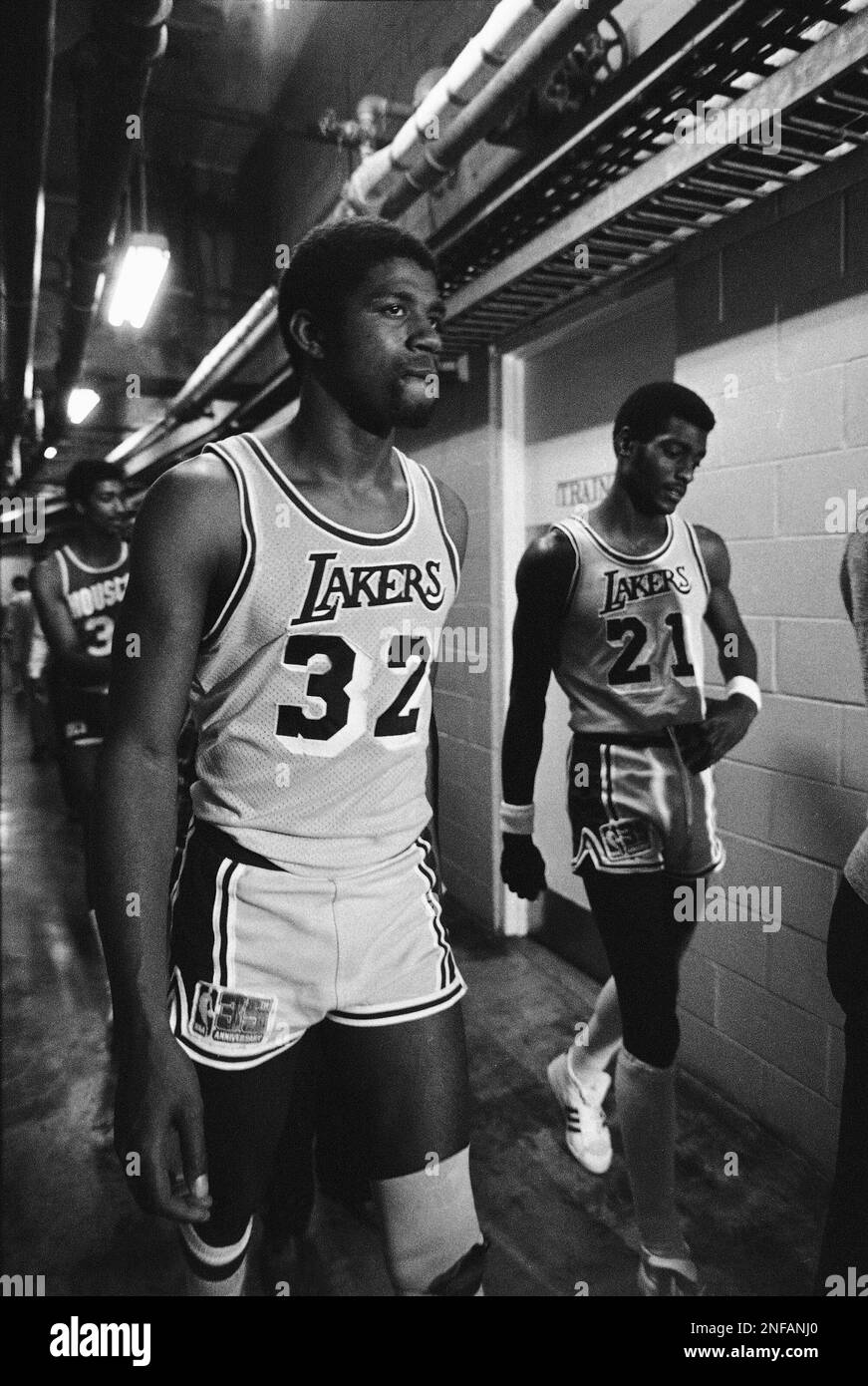 Philadelphia 76ers Andrew Toney (22) drives against Los Angeles Lakers Mike  Cooper, left, during second half action in the NBA Championship game at  Philadelphia June 7, 1982. The 76ers won, 135-102, and