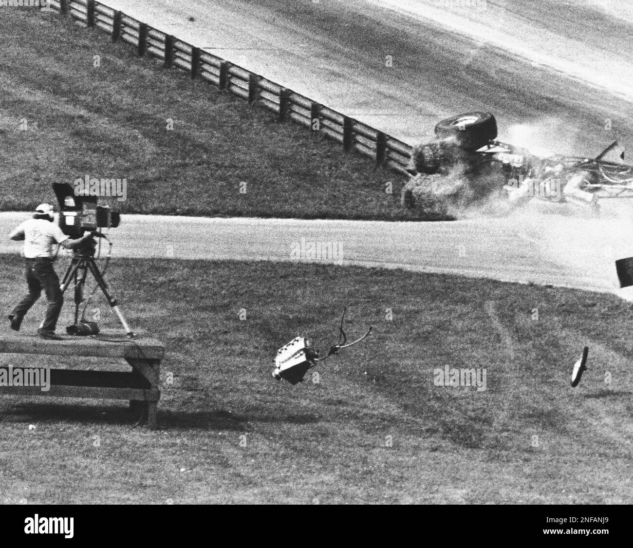 A dragster supercharger hits cameraman Joe Rooks of Bowling Green, Ohio