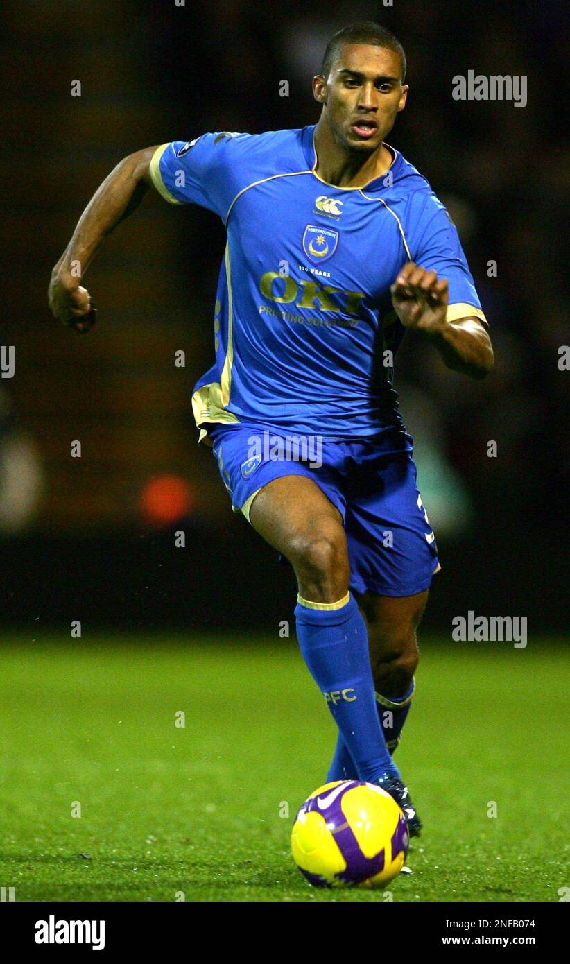 Portsmouth's Armand Traore runs with the ball during their Uefa Cup soccer match against AC Milan at the Fratton Park stadium, Portsmouth, England, Sunday, Nov. 23, 2008. (AP Photo/Tom Hevezi) Stock Photo