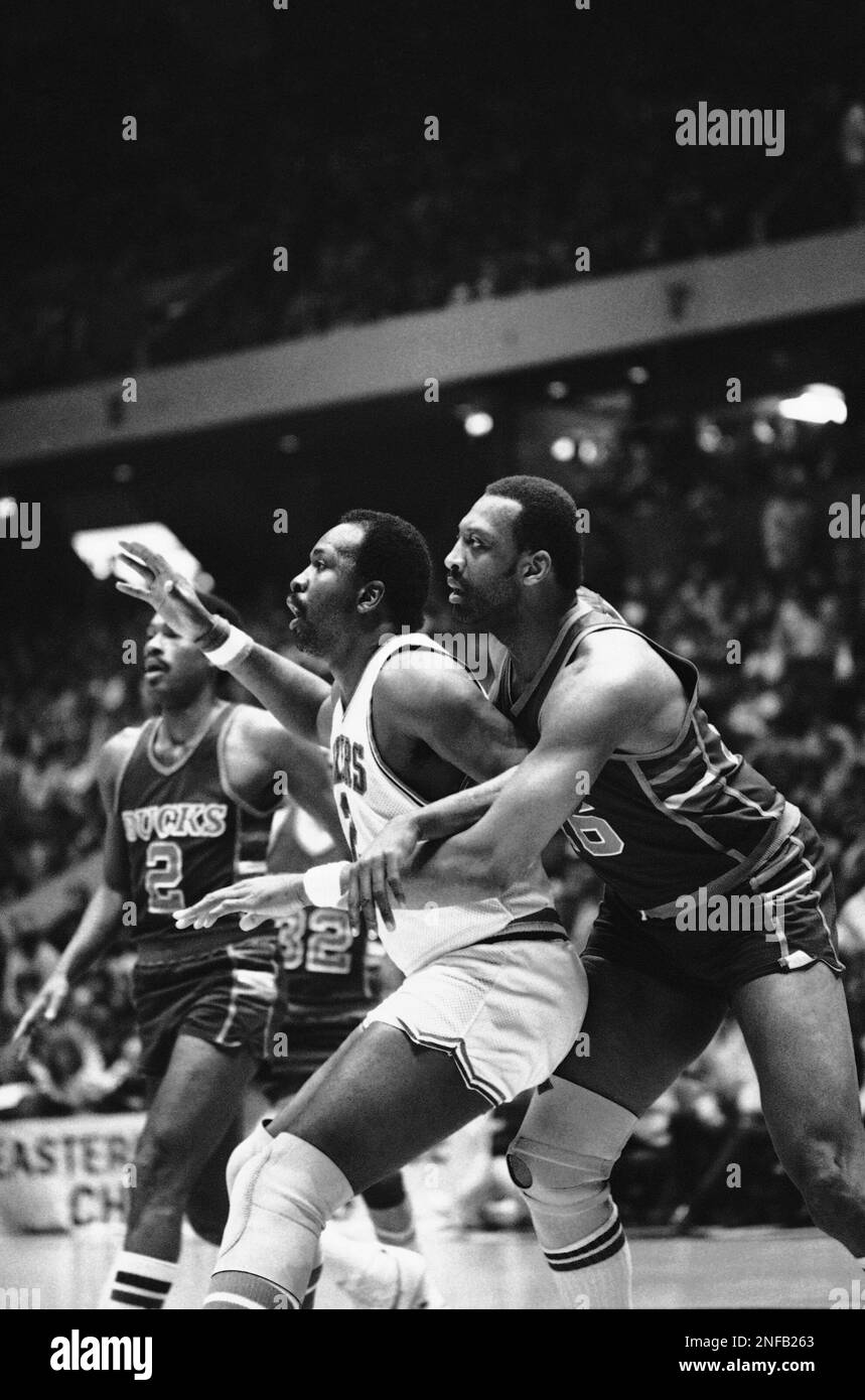 Philadelphia 76ers Moses Malone, white uniform, guard Milwaukee Bucks Bob  Lanier during second quarter NBA Eastern Conference finals action at  Philadelphia, May 18, 1983. (AP Photo/Rusty Kennedy Stock Photo - Alamy