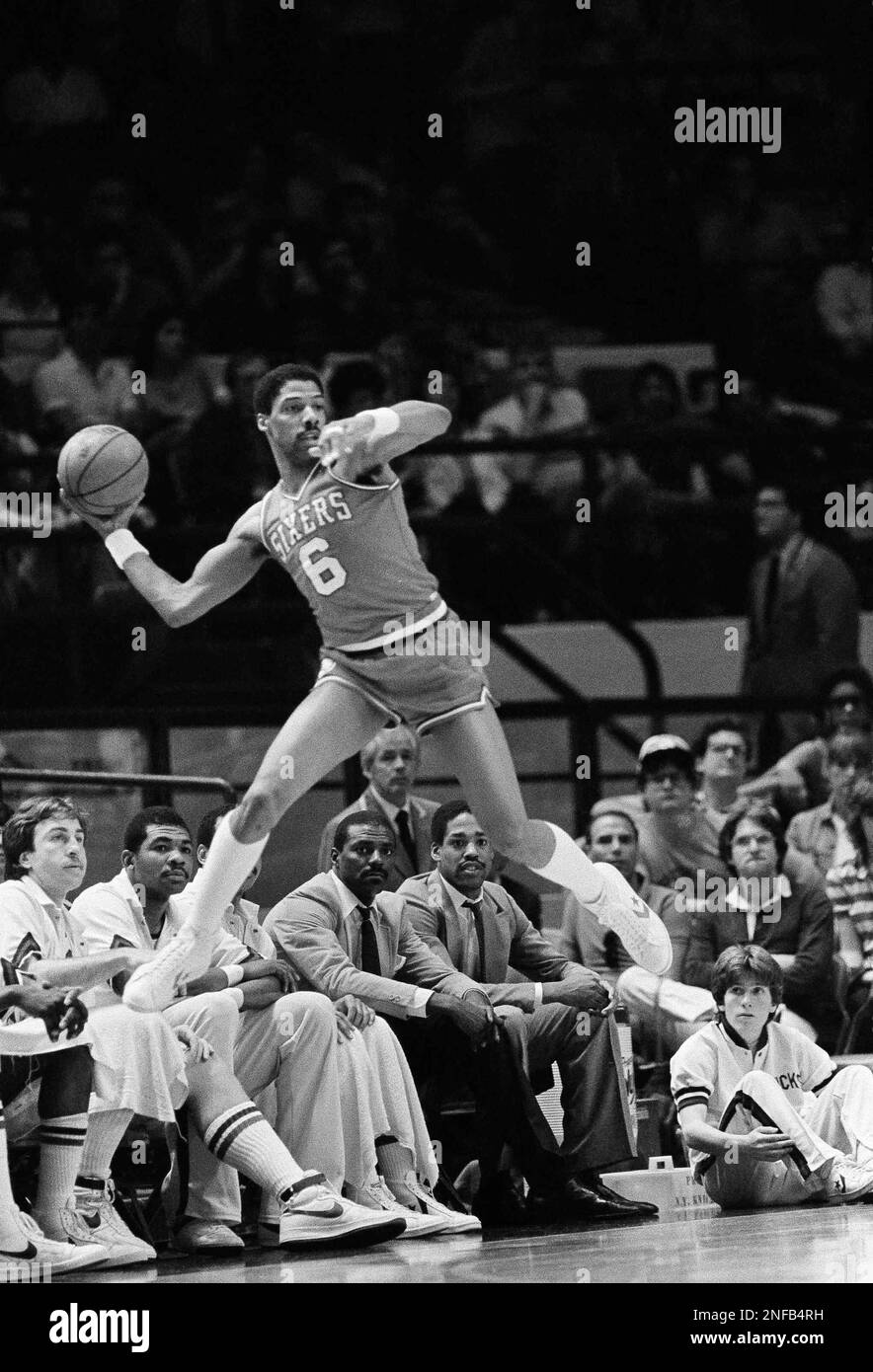 Julius Erving of the Philadelphia 76ers call out a play during a