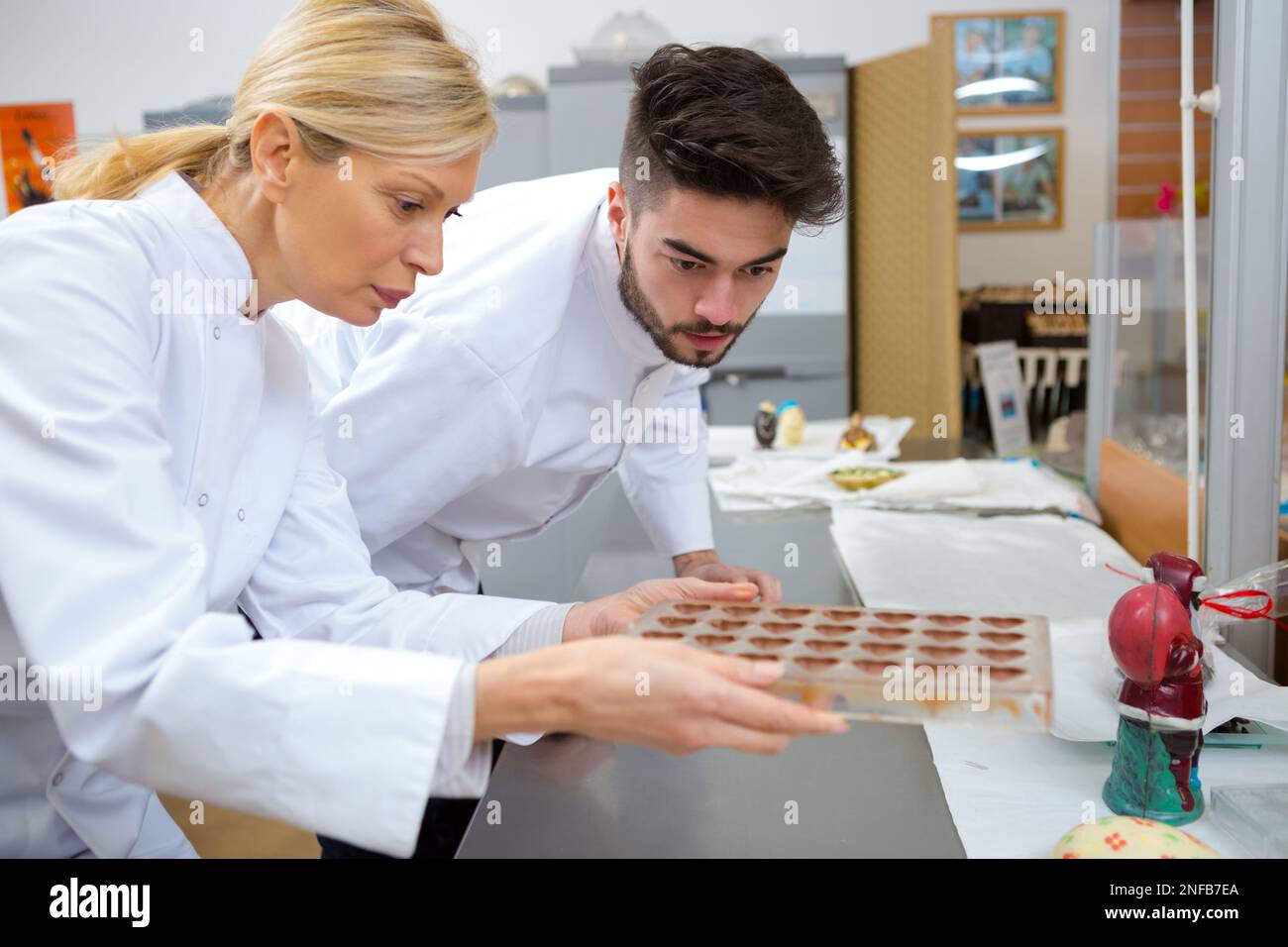 portrait of chocolate factory workers Stock Photo Alamy
