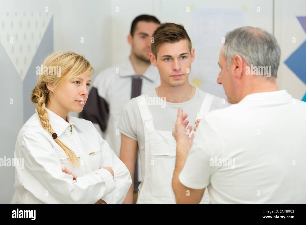 interior decorators learning from teacher Stock Photo - Alamy