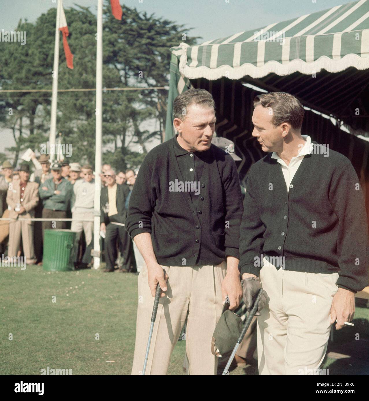 arnold palmer cigarette Arnold Palmer, at right smoking a cigarette, waits with Bud Ward at the  Lucky International at San Francisco, Jan. 26, 1962. (AP Photo Stock Photo