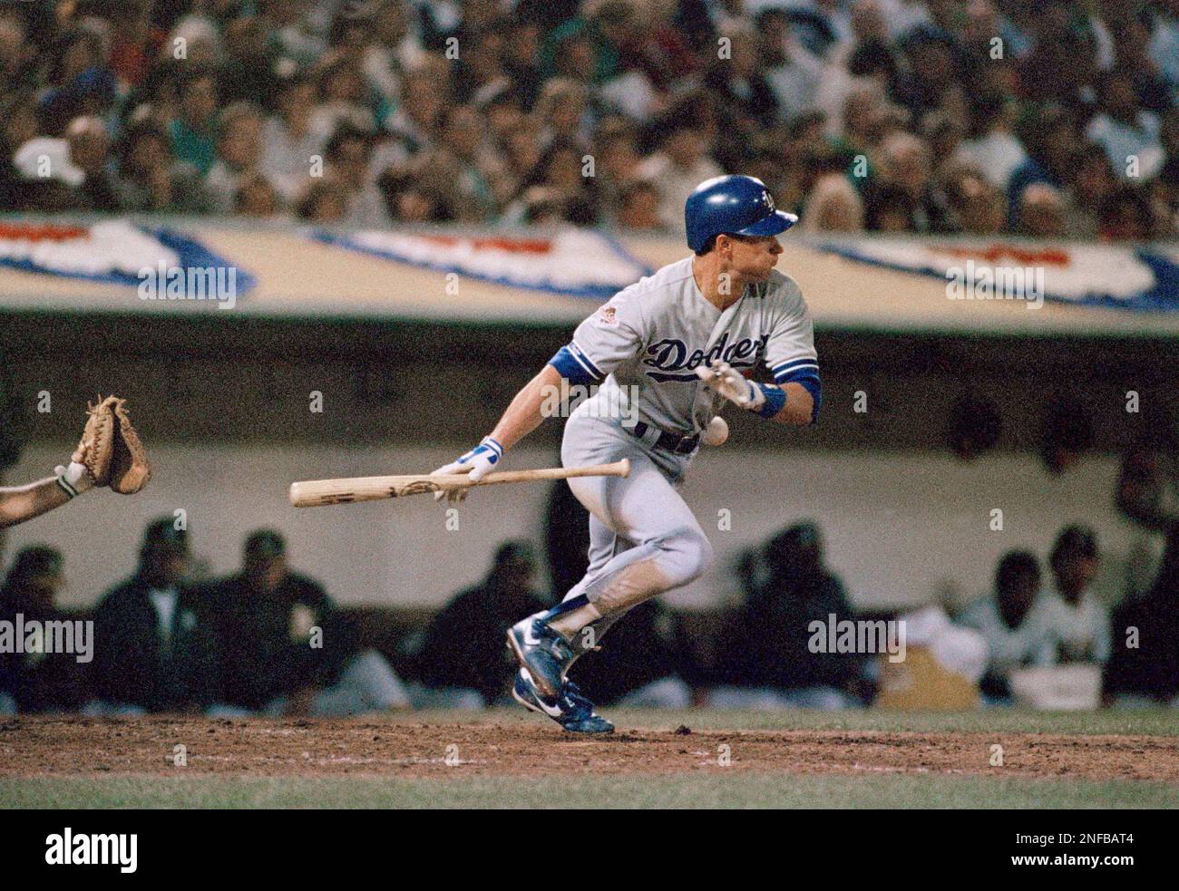 Los Angeles Dodgers Steve Sax is touched by the ball for an out as