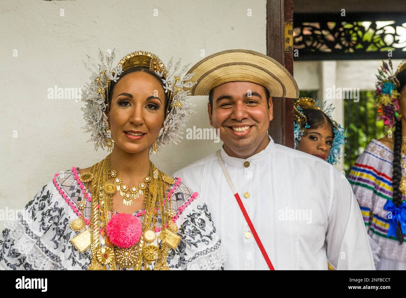 A Panamanian man and woman in traditional dress. The woman wears a