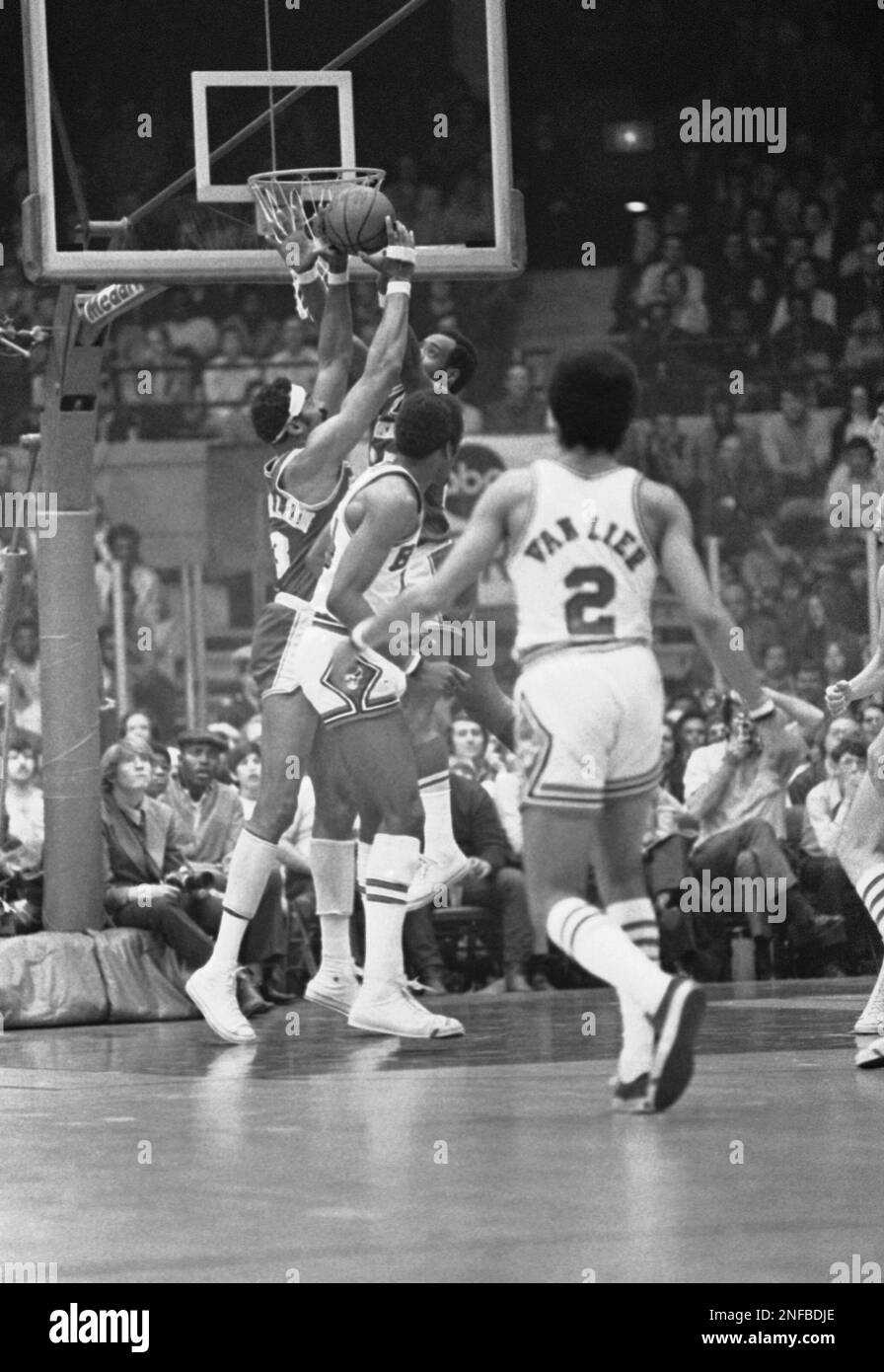 Gail Goodrich (25) of Los Angeles Lakers appears to be leapfrogging