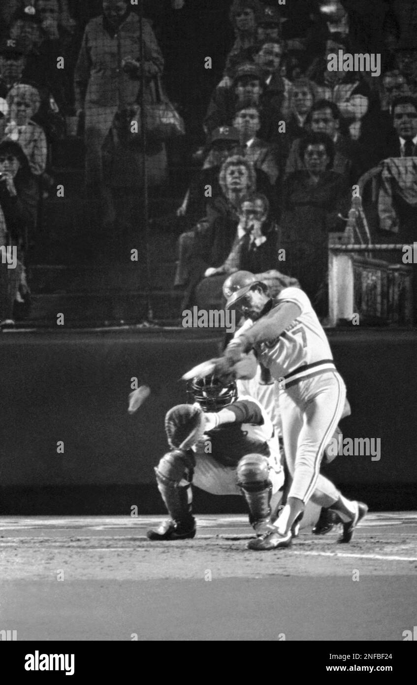 St. Louis Cardinals batter Cesar Cedeno, right, breaks his bat, but knocks  out a double in the fourth inning of their World Series game with the  Royals at Kansas City, Oct. 19