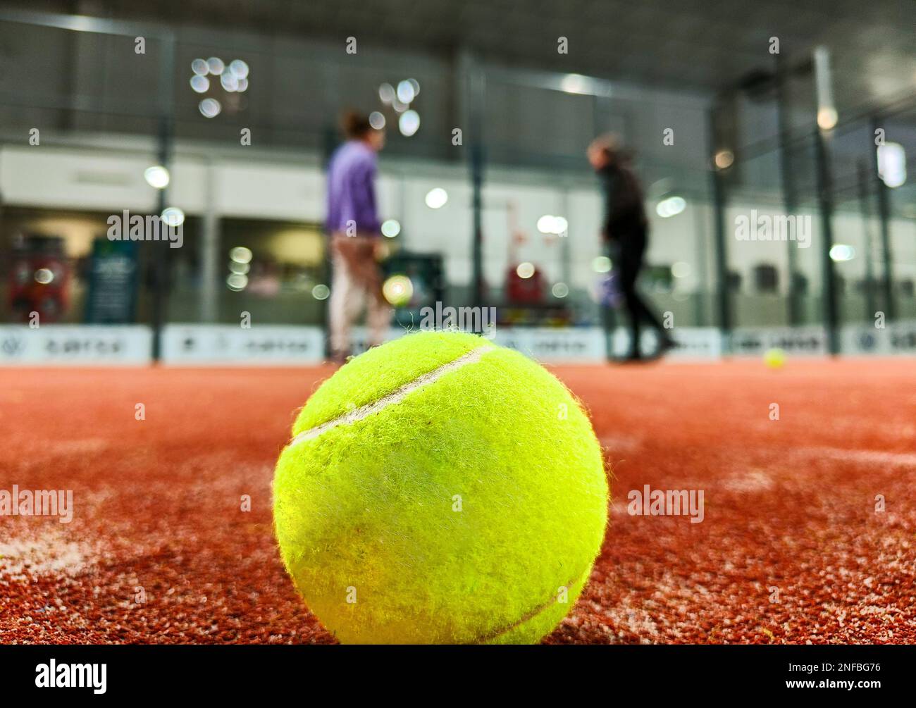 Detail shot of a paddle ball on the floor of the indoor paddle tennis