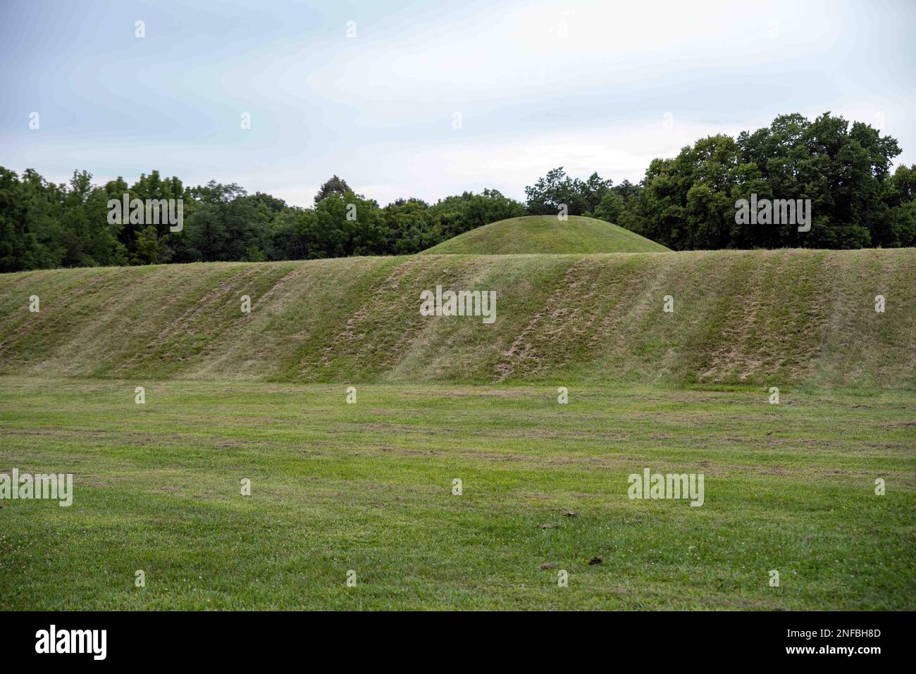 Native American Hopewell Culture prehistoric Earthworks burial mounds in Mound City Park Ohio. Ancient circular mounds and long mounds in a row. Stock Photo