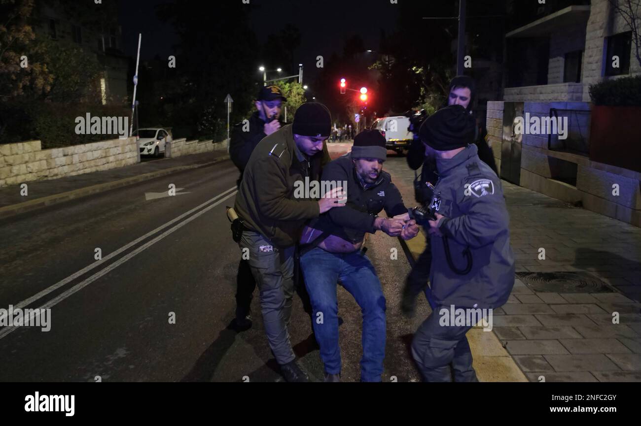 JERUSALEM, ISRAEL - FEBRUARY 16: Members of Israeli security force detain a pro-Netanyahu counter-protester who confronted anti-government protesters demonstrating against Israel's new government judicial system plan near the private home of prime minister Benjamin Netanyahu on February 16, 2023, in Jerusalem, Israel. Credit: Eddie Gerald/Alamy Live News Stock Photo
