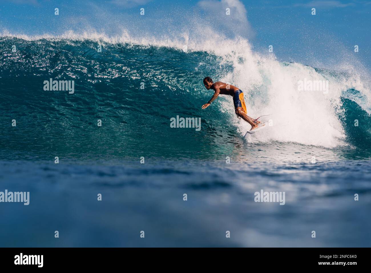 January 4, 2023. Bali, Indonesia. Surfer ride on surfboard in barrel