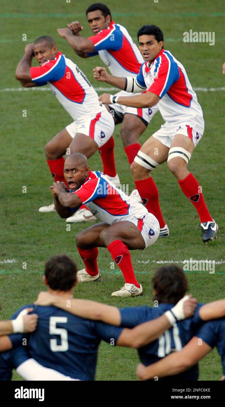 Pacific Islanders players, top, perform their Haka as they face the French team before the