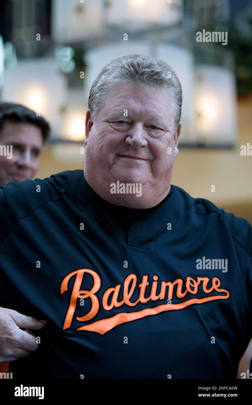 Former Baltimore Orioles player Boog Powell smiles while displaying the  teams away batting practice jersey during a press conference, Wednesday,  Nov. 12, 2008, in Baltimore. For the first time since 1972, the