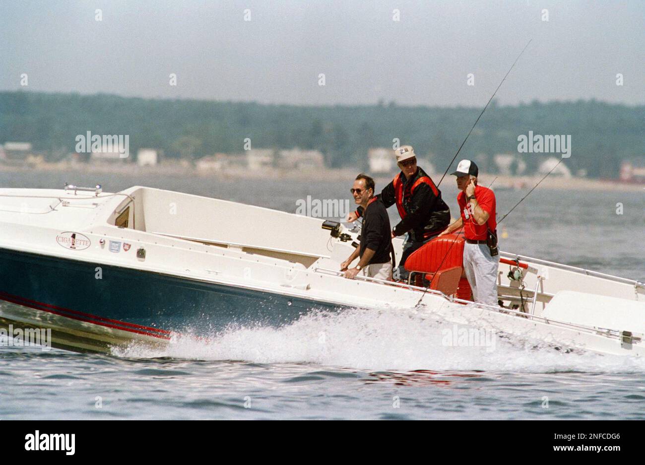 President George Bush, center, takes off in his speedboat Fidelity while  motoring near his home in Kennebunkport, Maine, July 1, 1989. Bush went out  fishing with no luck. The president is scheduled