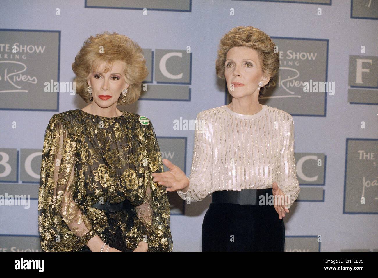 Nancy Reagan, right, joins talk show host Joan Rivers before the taping