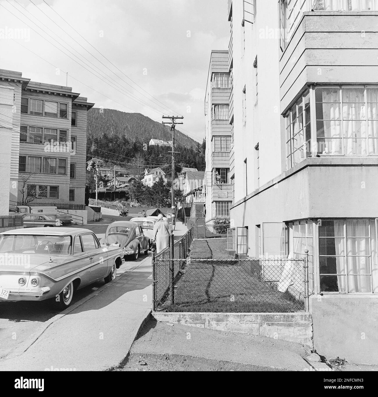 Photo shows a view winding up the street from the downtown area showing