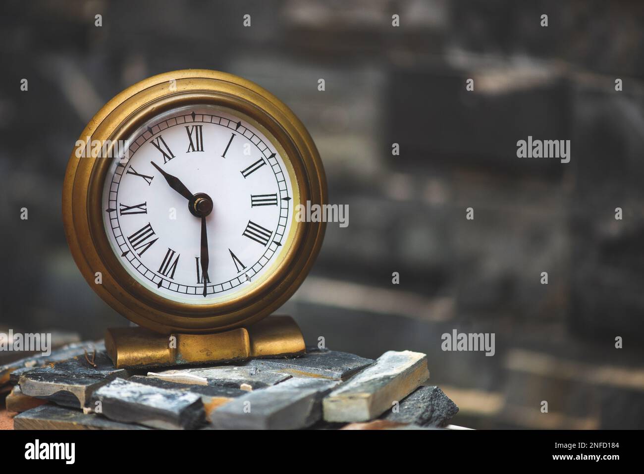Vintage background with retro alarm clock Stock Photo - Alamy