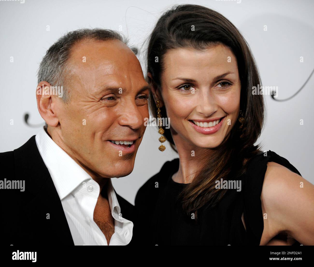 Neil Lane and Bridget Moynahan pose together at the private opening of ...