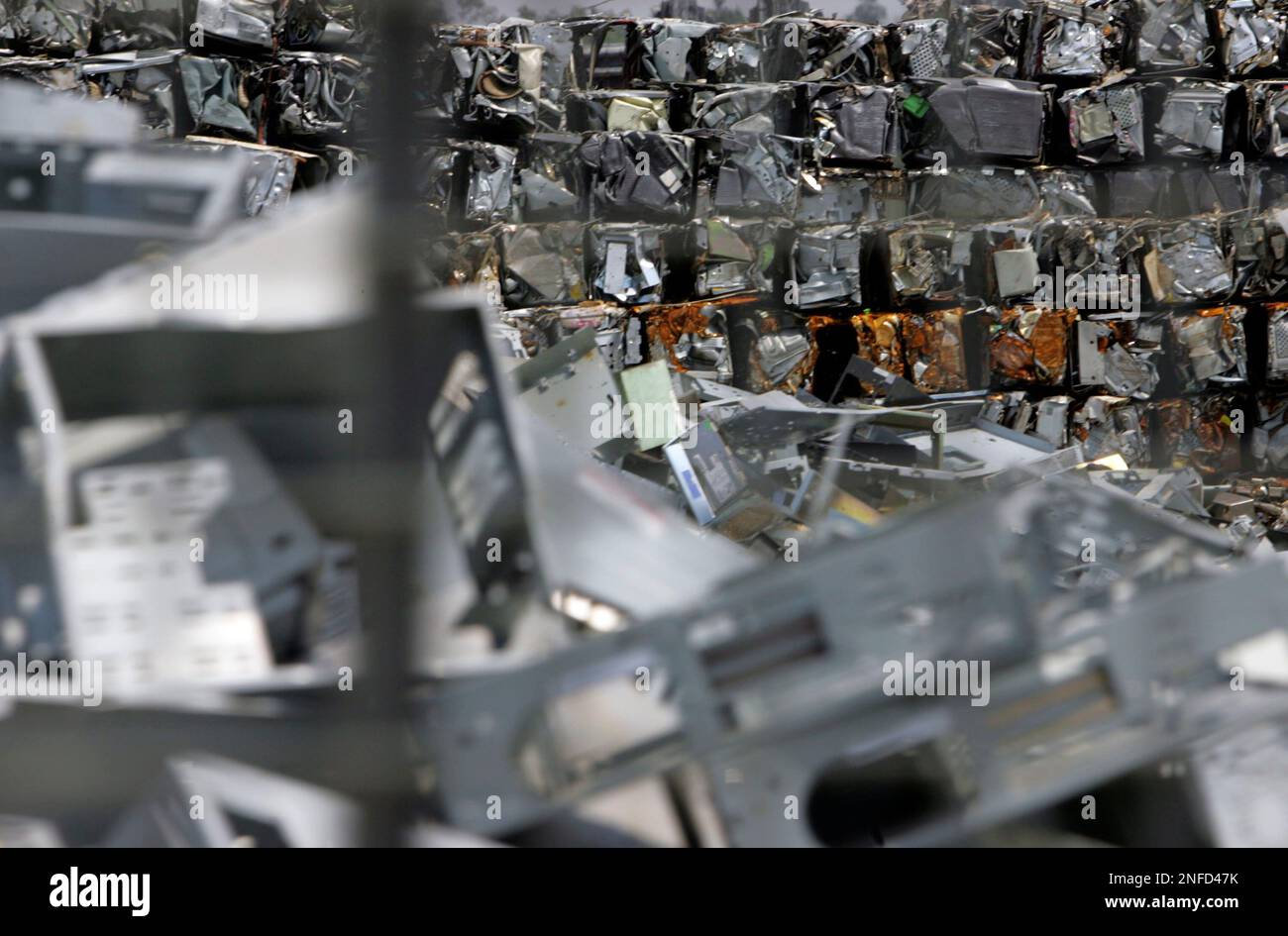 Piled up discarded computer parts lie in waiting in an area where much