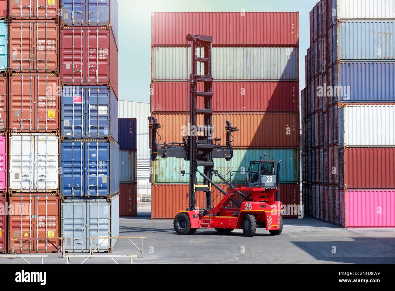 forklift truck Container boxes in a logistics yard with a stack of ...