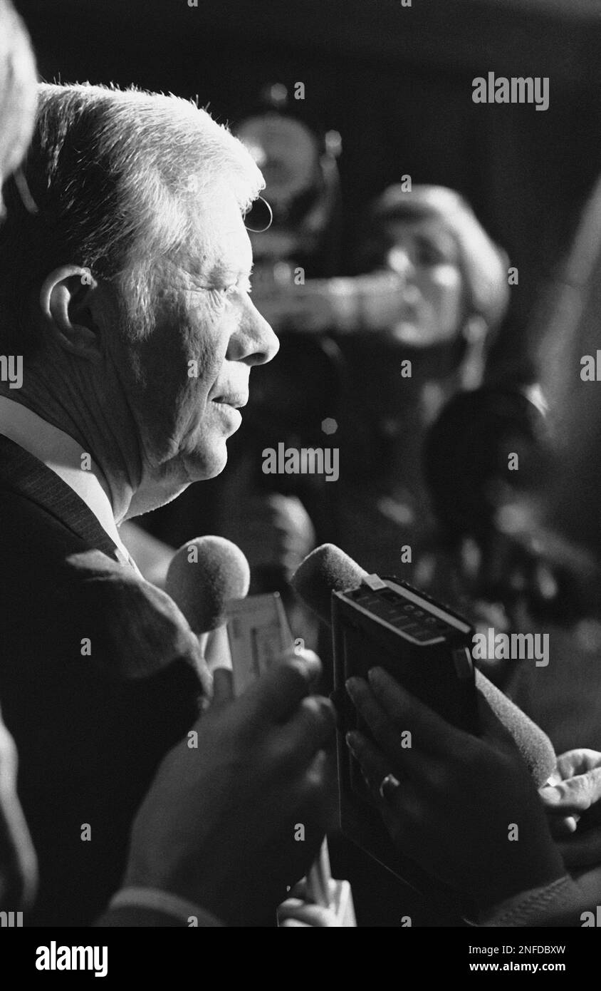 Former President Jimmy Carter speaks with reporters, Oct. 7, 1981