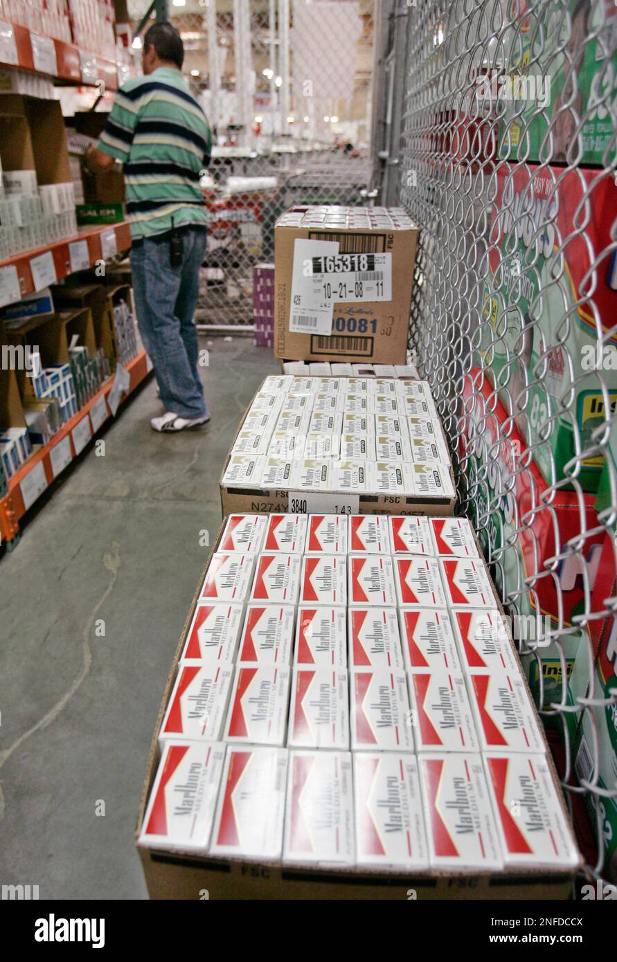 Cartons of Marlboro cigarettes, an Altria product, are seen on display