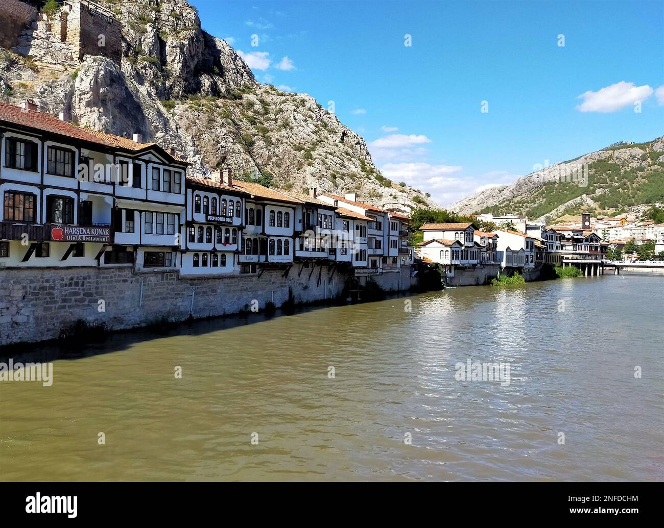 Old Turkish houses panoramic view by the Yesilirmak(Green River) in Amasya City. Amasya is populer tourist destination in Turkey. Stock Photo