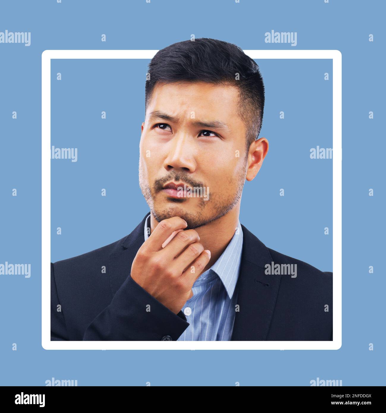 Thinking, confused and businessman in studio with mockup, advertising and blue background space. Doubt, unsure and contemplation with asian guy Stock Photo