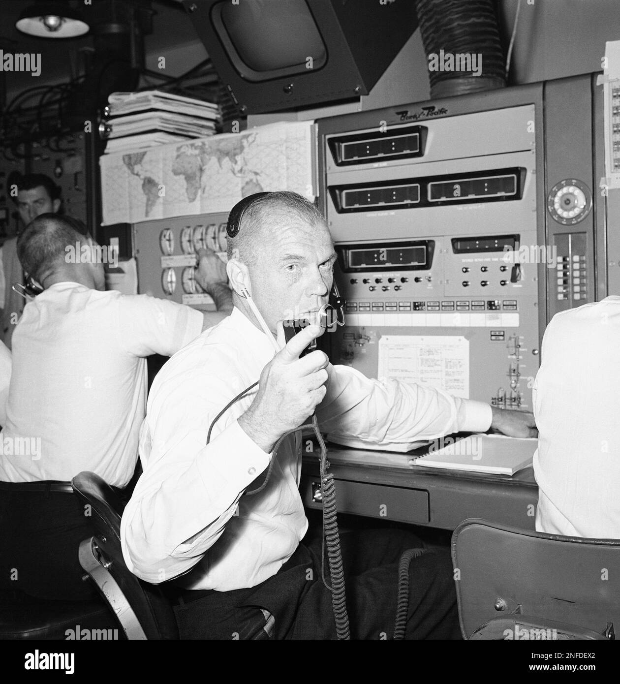 U.S astronaut John Glenn in the telemetry control room aboard the NASA ...
