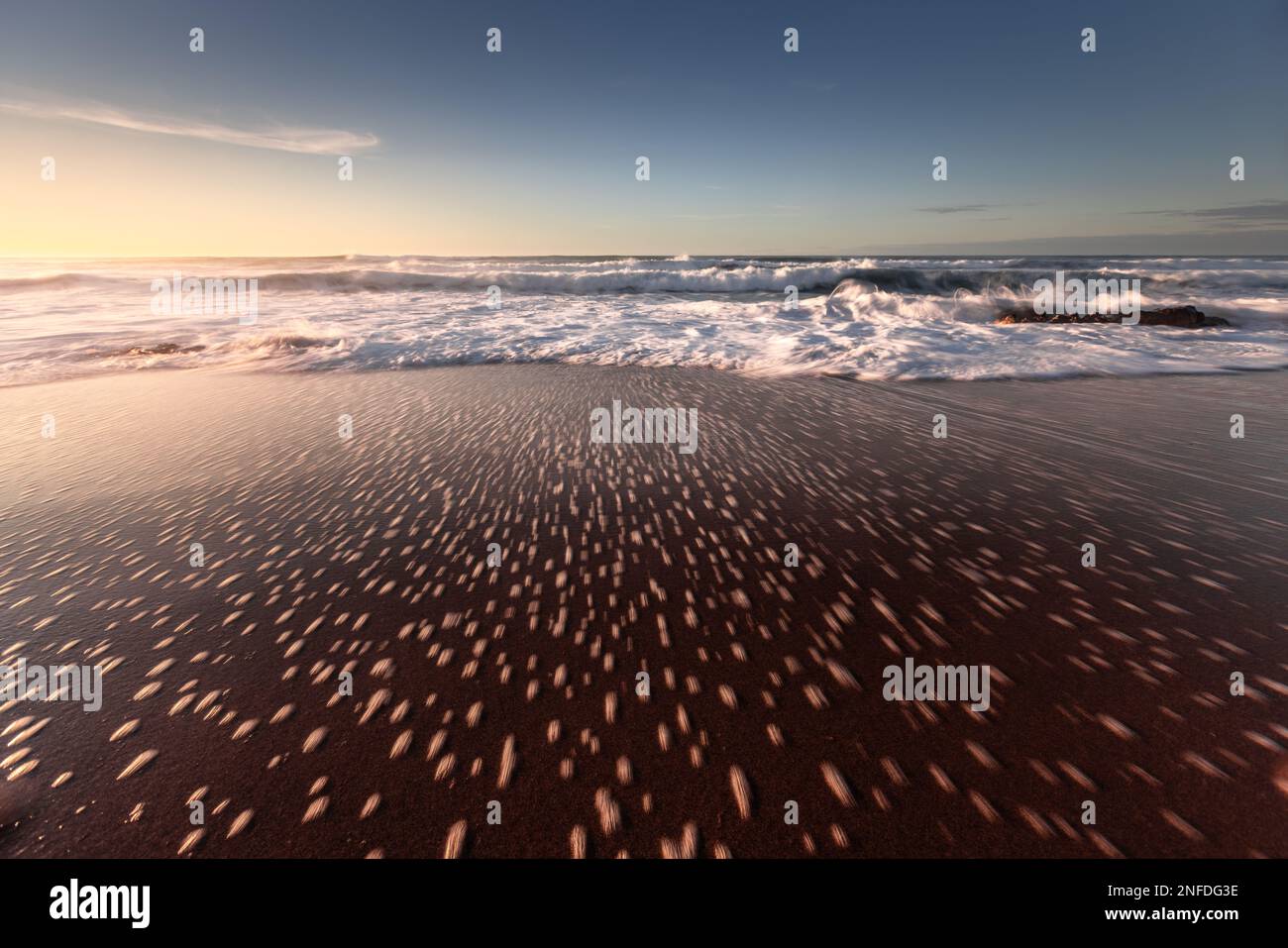 Waves reaching sea coast sunset hi-res stock photography and images - Alamy