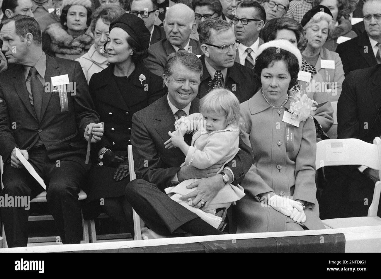 Gov. Jimmy Carter, holding daughter Amy, and Rosalynn Carter, right ...