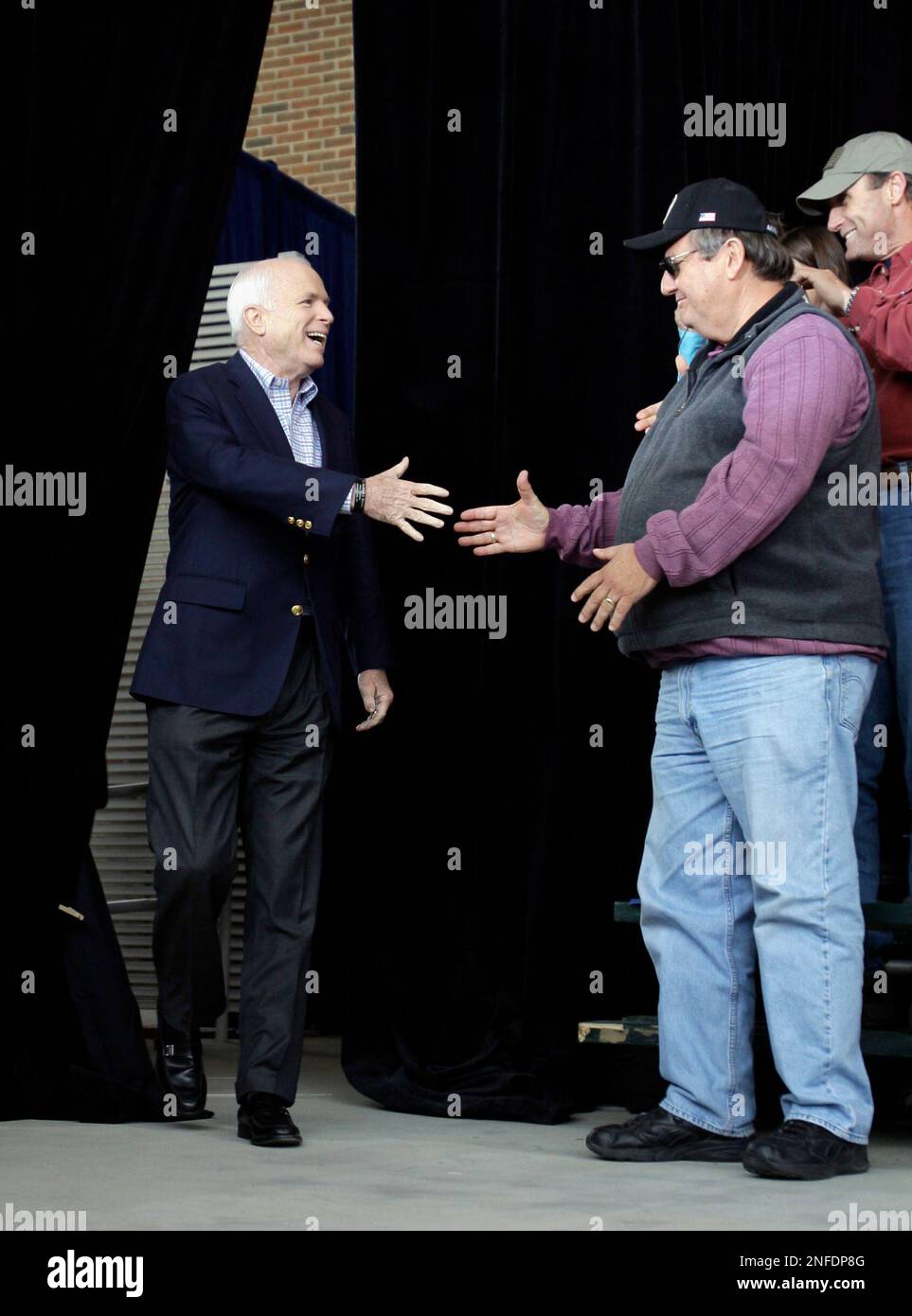 Republican presidential candidate Sen. John McCain, RAriz., shakes