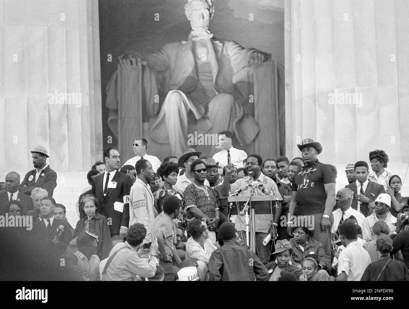 Dwarfed by the statue of Abraham Lincoln, the Rev. Ralph David