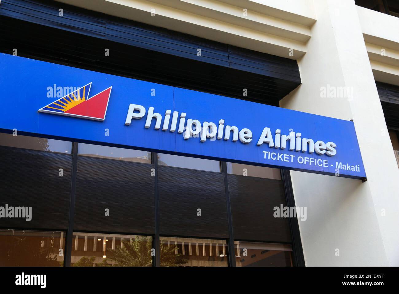 MANILA, PHILIPPINES - NOVEMBER 28, 2017: Philippine Airlines ticket office in Makati, Manila. Philippine Airlines is the flag carrier of the Philippin Stock Photo