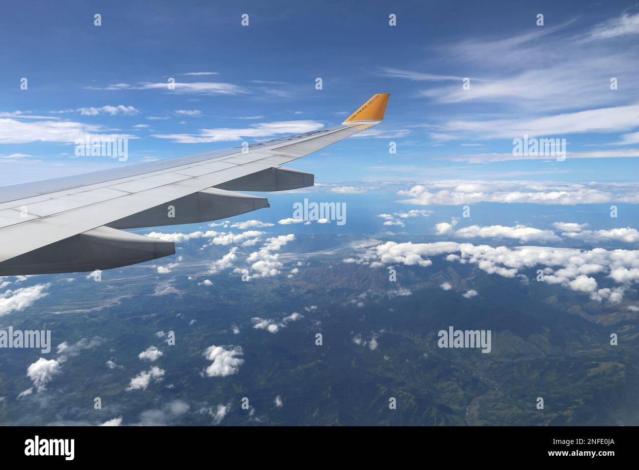 RIZAL, PHILIPPINES - NOVEMBER 24, 2018: Aerial view of Rizal province of Philippines from Cebu Pacific airline. Wing view of Philippines. Stock Photo