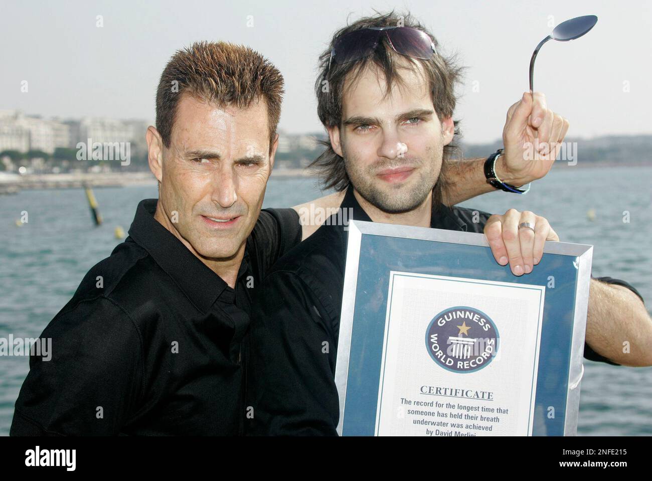 Israeli-British illusionist Uri Geller, left, and Hungarian escape