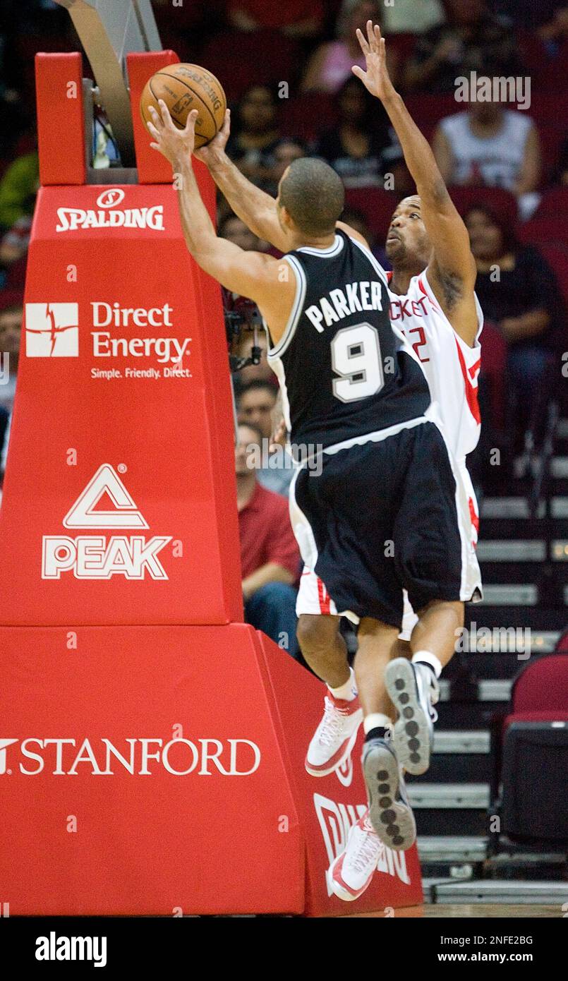 San Antonio Spurs guard Tony Parker #9 drives to the basket over ...