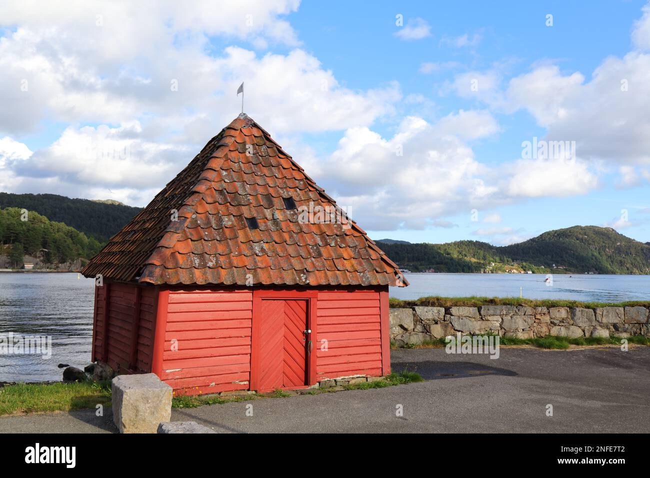 Falun red cabin in Gronnes peninsula in Flekkefjord, Norway. Stock Photo