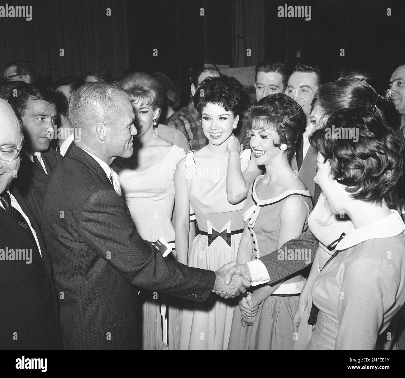 Astronaut John H. Glenn, Jr., meets the girls of the cast of the ...