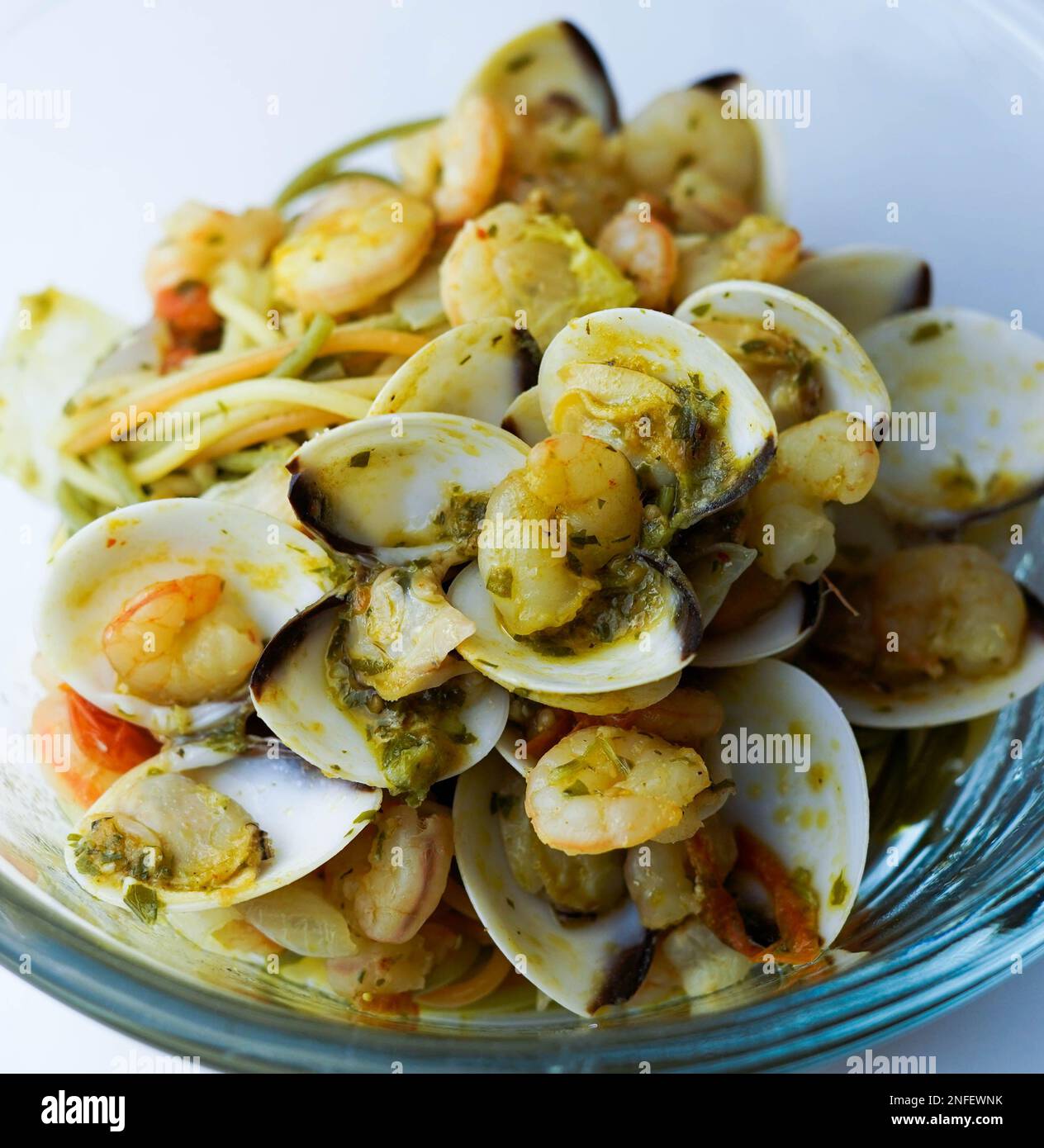 Italian spaghetti with clam sauce and prawns. Spaghetti frutti di mare