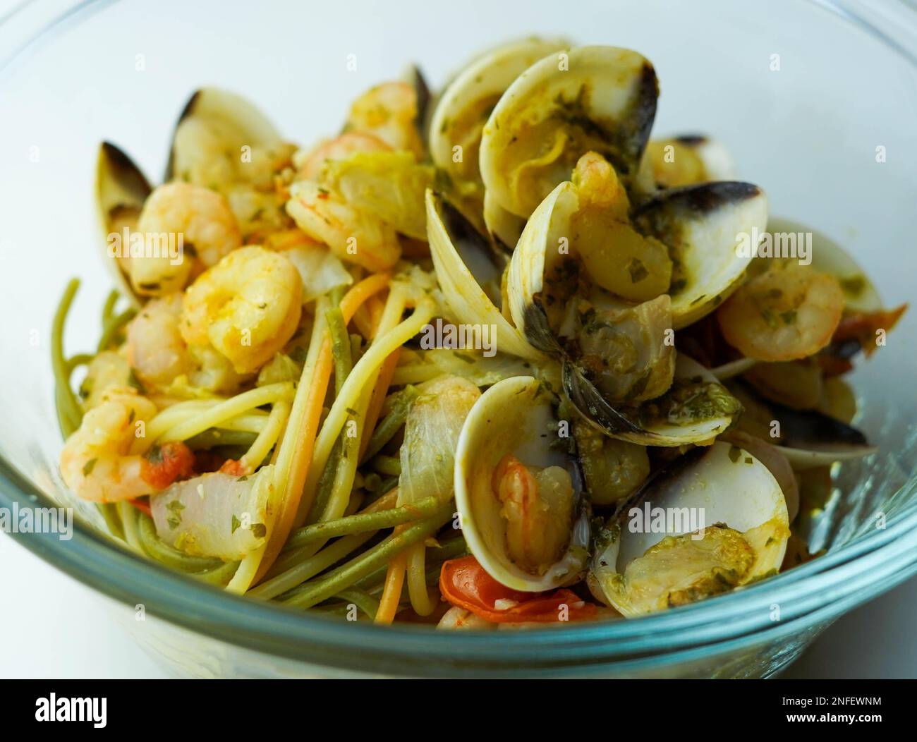 Italian spaghetti with clam sauce and prawns. Spaghetti frutti di mare