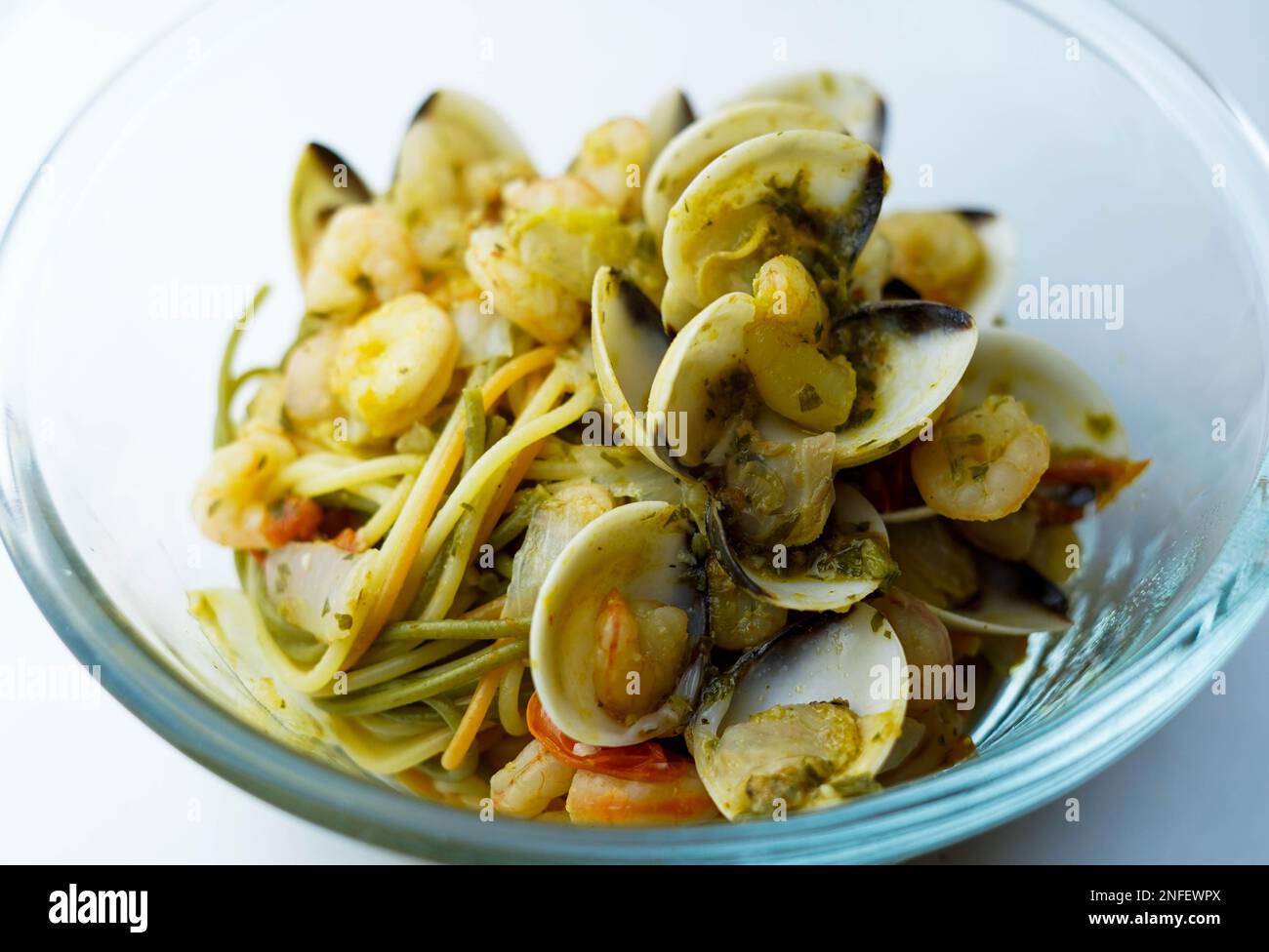 Italian spaghetti with clam sauce and prawns. Spaghetti frutti di mare