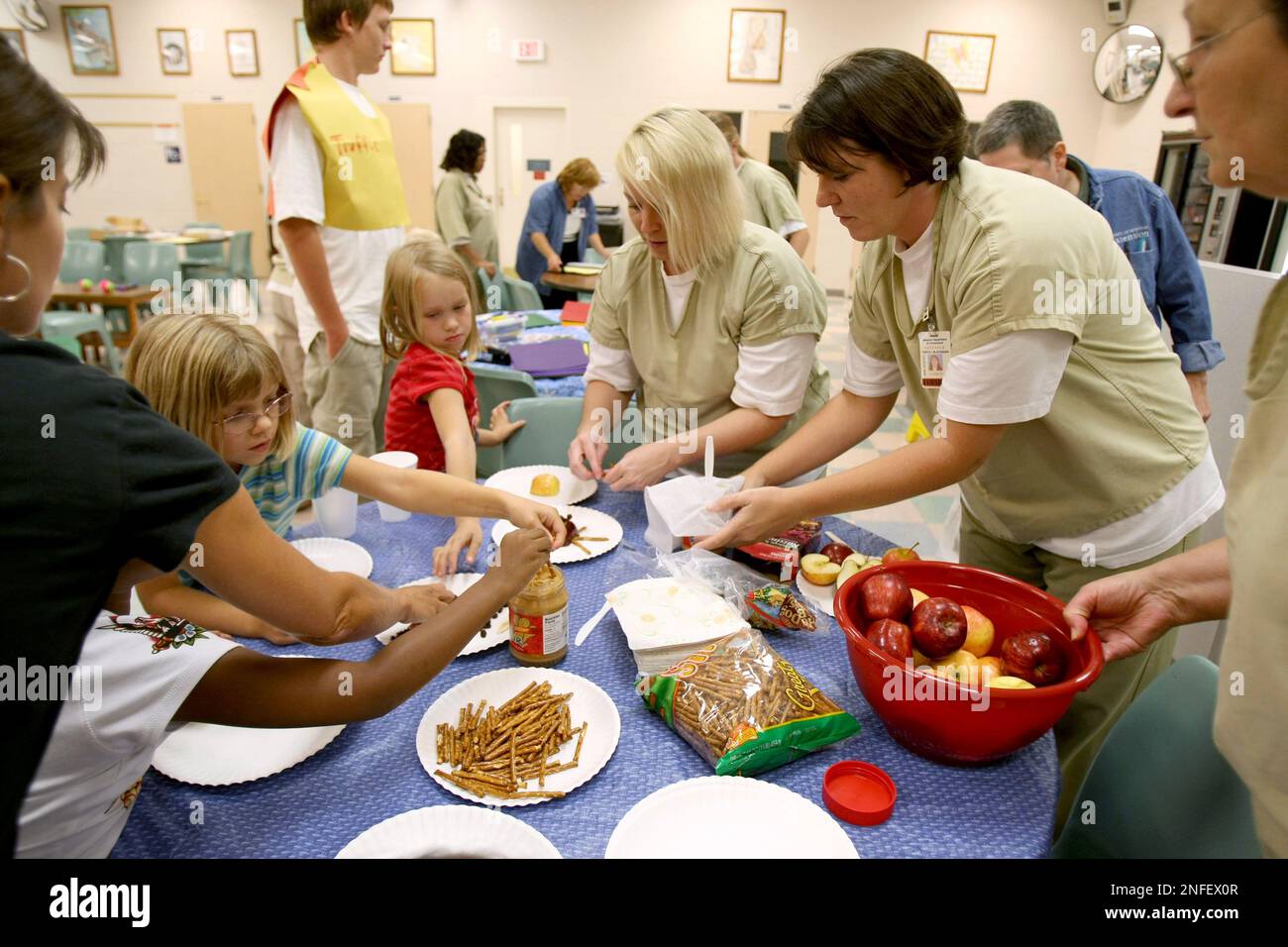 Offenders and their families take part in a 4H project on Saturday