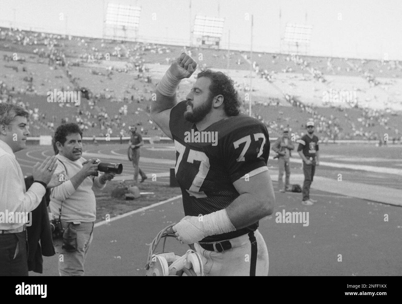 Los Angeles Raiders Lyle Alzado gives a fist of Victory after the Raiders  beat the Pittsburgh Steelers in playoff game in Los Angeles on Sunday, Jan.  2, 1984, 38-10. The victory advanced