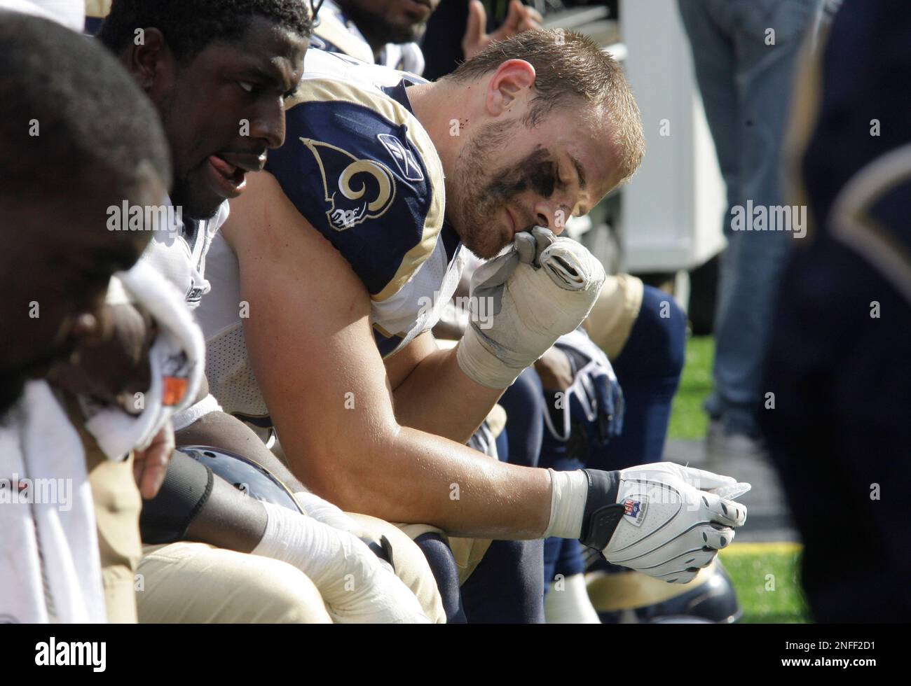 Seattle Seahawks defensive end Anthony Hargrove (94) celebrates after  sacking Chicago Bears quarterback Caleb Hanie in the first half of an NFL  football game in Chicago, Sunday, Dec. 18, 2011. (AP Photo/Charles