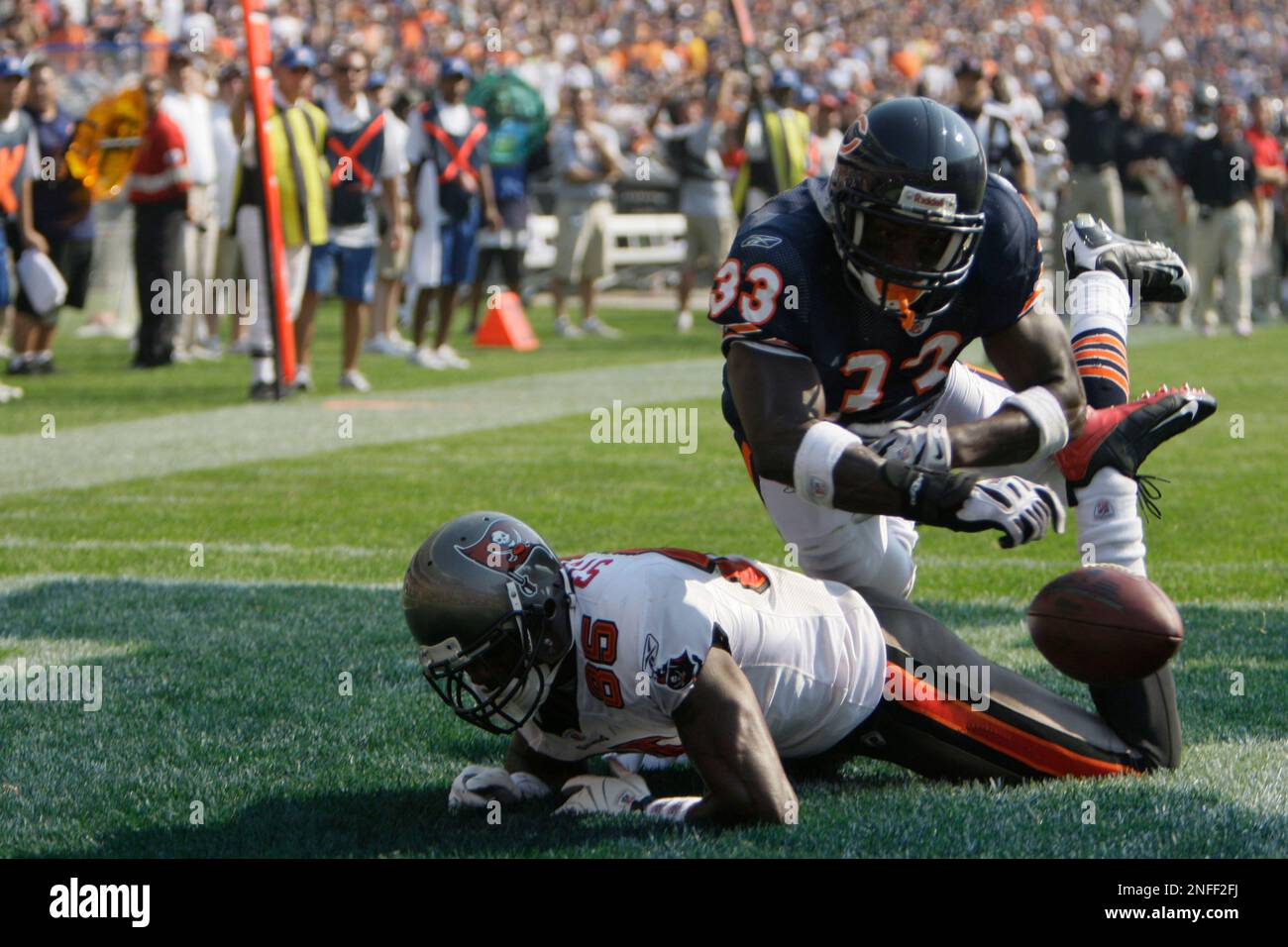 Chicago Bears' Charles Tillman breaks up a touchdown pass to Tampa Bay  Buccaneers' Earl Bennett during the fourth quarter of an NFL football game,  Sunday, Sept. 21, 2008, in Chicago. The Bucs